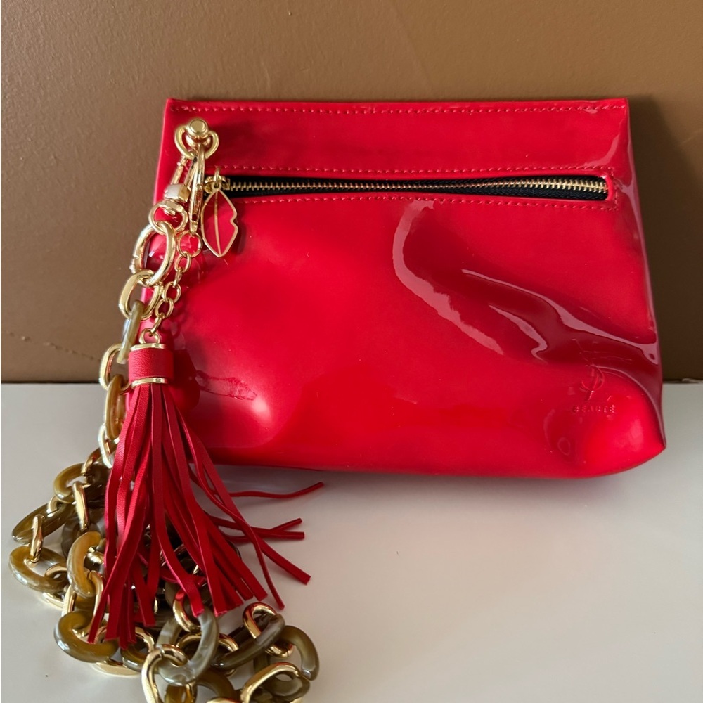 YSL Cosmetic bag converted into a crossbody
